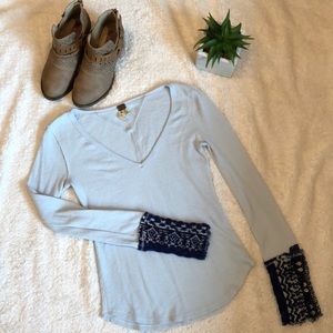 Adorable long sleeve We the free medium blue top.